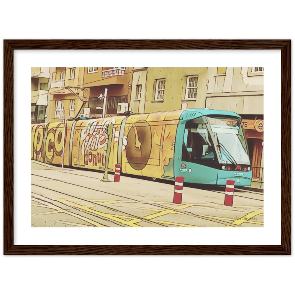 Yellow Tram Framed Print by John Brython