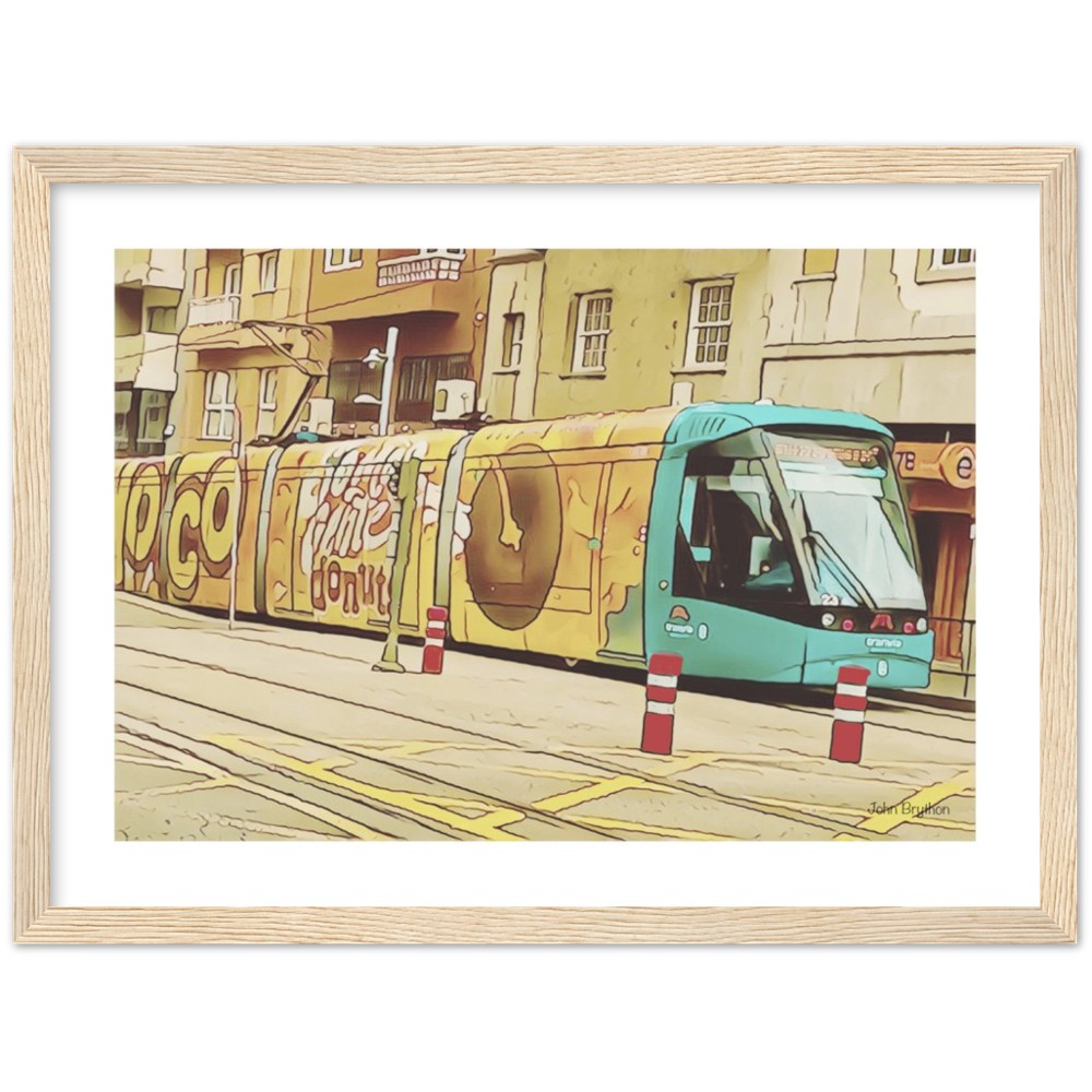 Yellow Tram Framed Print by John Brython